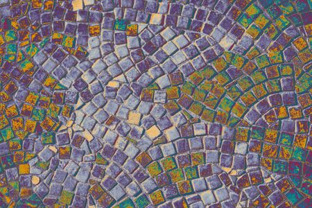 Decorative stone background built of little stonesの写真素材