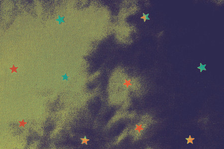 Star shaped bright paper on a blue fabric  background