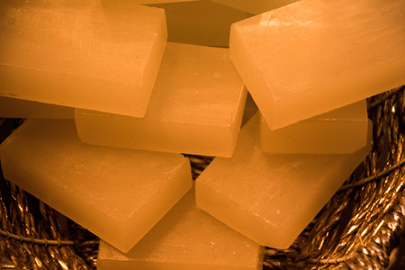 Collection of bars of fragrant hand made organic soap in a basketの写真素材