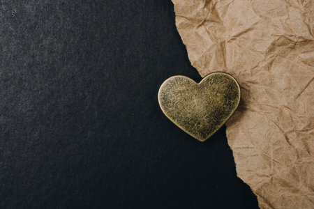 Retro metal heart on paper for love card and valentine day concept
