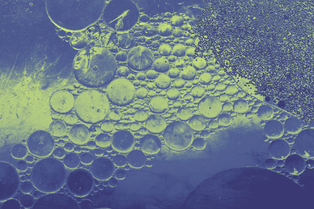 Macro shot of water oil emulsion form abstract background