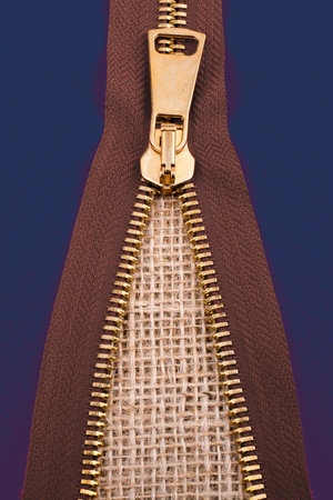 Closeup of a colorful  zipper on linen canvas