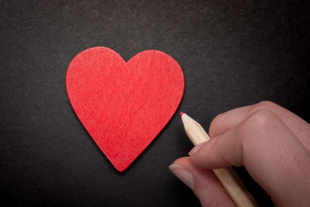 Heart and pencil for love and valentine day conceptの写真素材