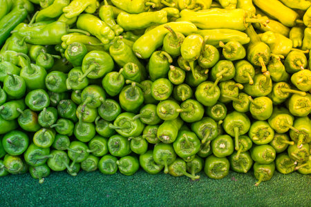 A Lot of green Peppers found as food background