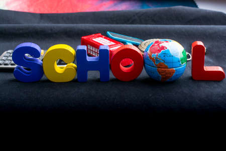 Education concept by School lettering  with colorful wooden lettersの写真素材