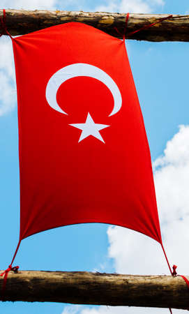 Turkish national flag in open air on a ropeの写真素材