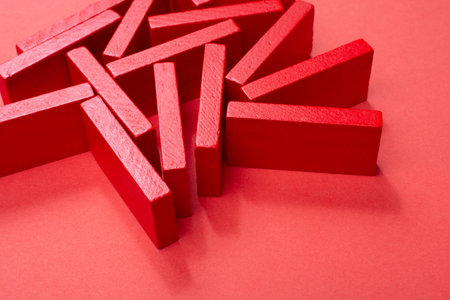 Red Colorl Domino Blocks placed on red background