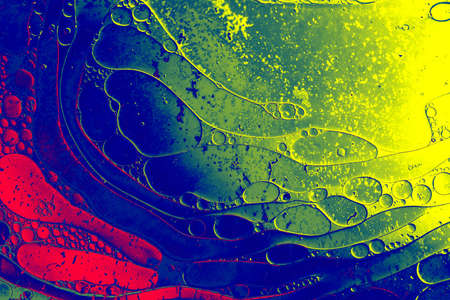 Oil bubbles inside water base form patternsの写真素材