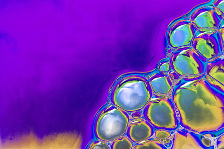 Colorful water bubles on water as abackground