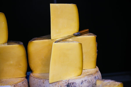 cuts of kashkaval or kasseri  cheese for sale on the shelf