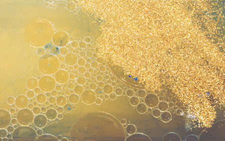 Macro shot of water oil emulsion form abstract backgroundの写真素材