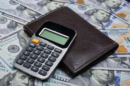 Calculator on  American dollars. Financial conception. Finance and Savingsの写真素材