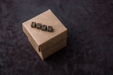 The word love with metal letters  on box  as love conceptの写真素材