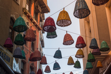 Empty wicker baskets used as decorative lamps in the streetの写真素材