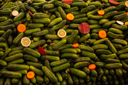 Fresh green bunch of cucumbers for sale in local market.の写真素材