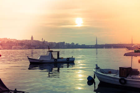 Fishing boat in the waters of the seaの写真素材