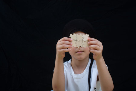 man holding last piece of jigsaw puzzle as business strategy concept
