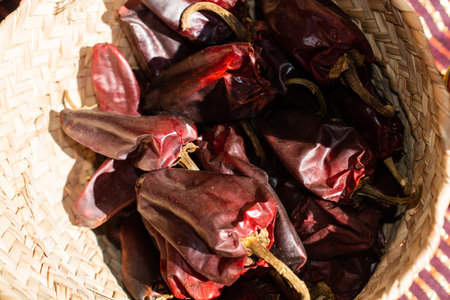 A Lot of dried Red Peppers hanging found as food backgroundの写真素材