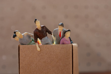 Tiny figurine of men  and women miniature model in viewの写真素材