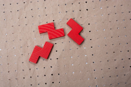 Concept of creative logical thinking. Different colorful wooden blocks. Geometric shapes in...