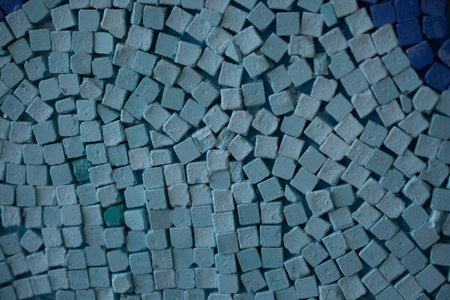 concrete wall is covered with mosaic mosaic for decoration.