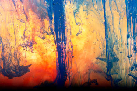 Abstract background from dense paint dissolve in waterの写真素材