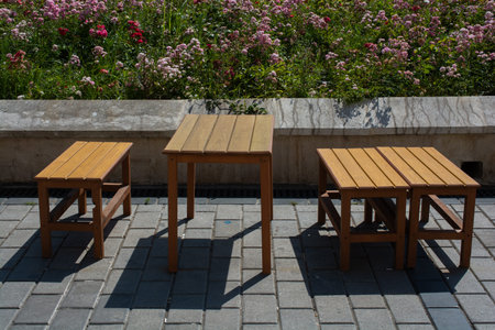 Empty beautiful  tables and chairs at lockdown city street, coronavirus quarantine.の写真素材