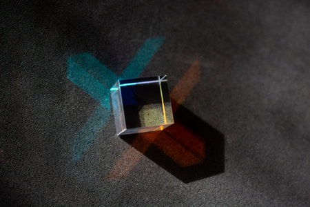 Luminous prism cubes refract light in different colors.