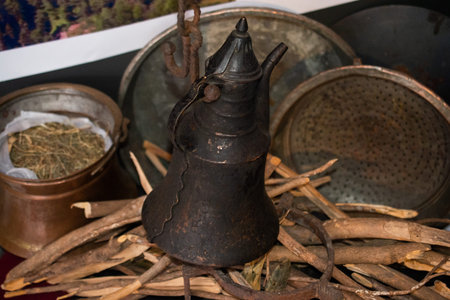Very old style metal ewer water jar in view