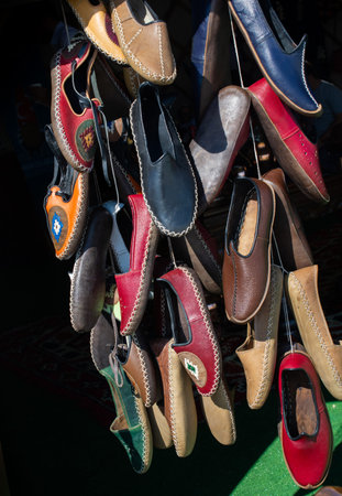 Set of traditional hand made leather shoes in a bazaarの写真素材