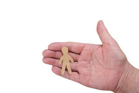 Man shape cut out of paper isolated on white  background.の写真素材