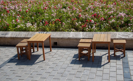 Empty beautiful  tables and chairs at lockdown city street, quarantine.