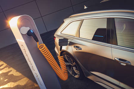 3d rendering of Electric EV car or vehicle at charging station charges battery with cable and plug or charger for ecological range and sustainable energyの写真素材