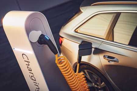 3d rendering of Electric EV car or vehicle at charging station charges battery with cable and plug or charger for ecological range and sustainable energyの写真素材