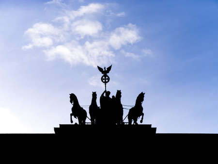 brandenburger tor in berlin with blue cloudy skyの写真素材