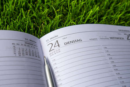 calendar (december) on green meadowの写真素材