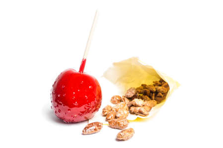 toffee apple, sugared almonds (isolated)の写真素材