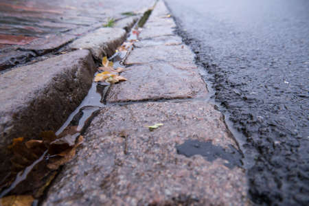 drip rail near sidewalkの写真素材