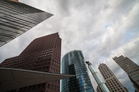 buidlings at potsdamer platz berlin with stormy clouds