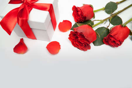 red roses and present box isolatedの写真素材
