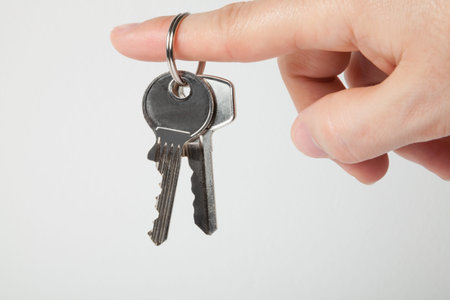 hand holding a bunch of keys