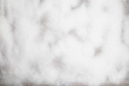 snow background on wooden tableの写真素材