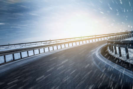 winter on highway curveの写真素材