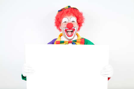 clown with blank board on white backgroundの写真素材