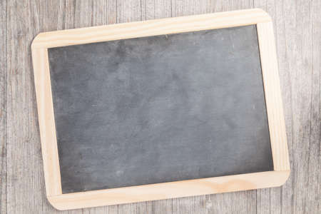 small blackboard on wooden plateの写真素材