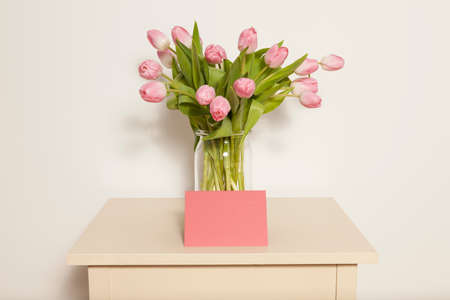 Tulips and greeting cardの写真素材