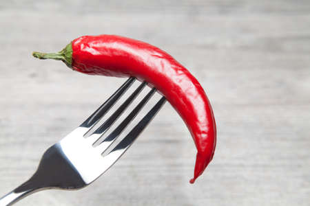 peperoni impaled with a forkの写真素材