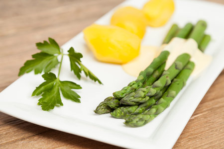 Green asparagus on plateの写真素材