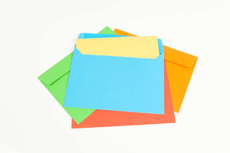 Colored envelopes on whiteの写真素材