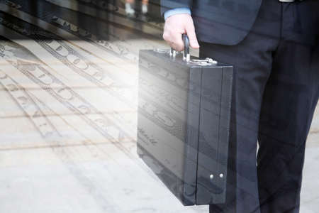 Briefcase and Dollar moneyの写真素材